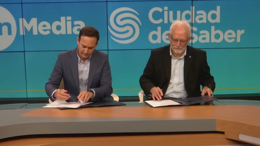 Representatives from Ciudad del Saber and TVN Media standing together at an agreement signing in Panama