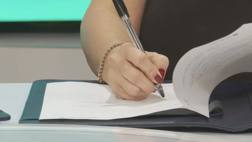 Business professionals discussing sustainability and corporate responsibility during an event in Panama