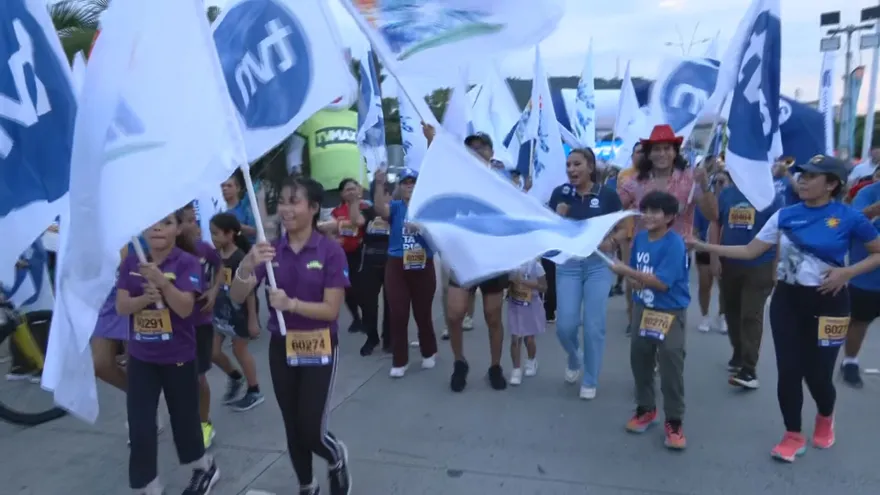 Participants and volunteers at a charity relay event in Panama supporting children with cancer