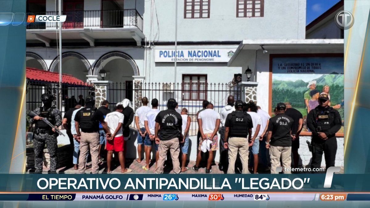Police officers detaining suspects during an anti-gang operation in Coclé province, Panama