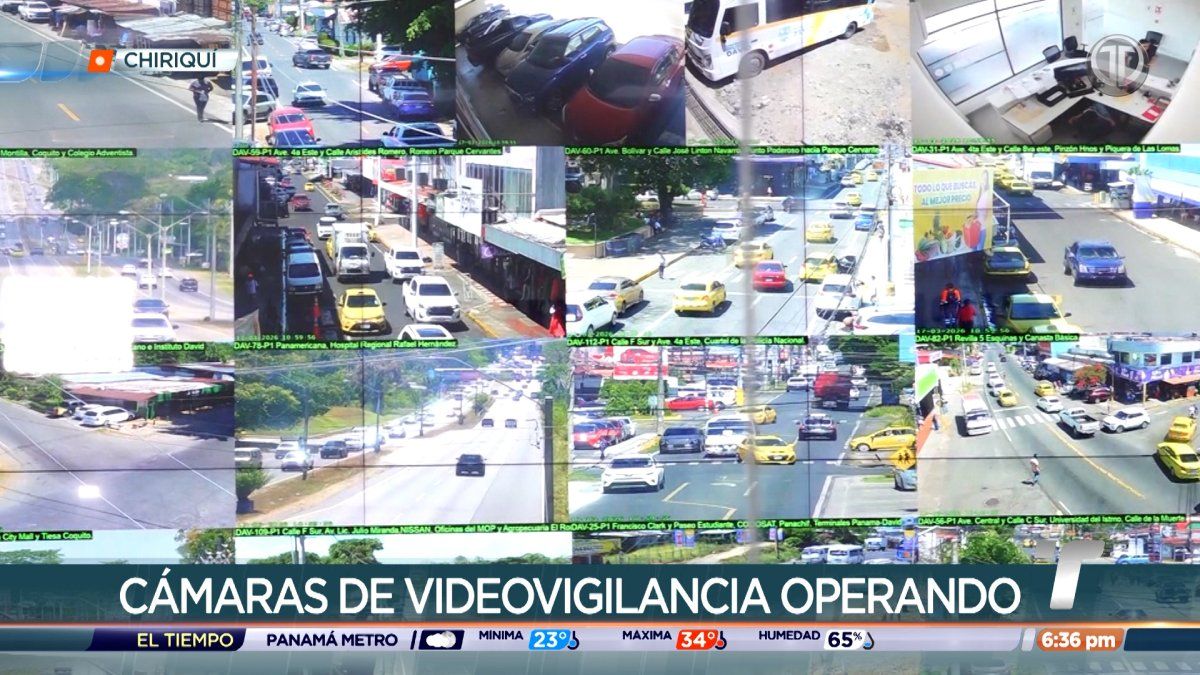 Surveillance camera overlooking a city street and mounted security equipment near a parade route in David, Chiriquí