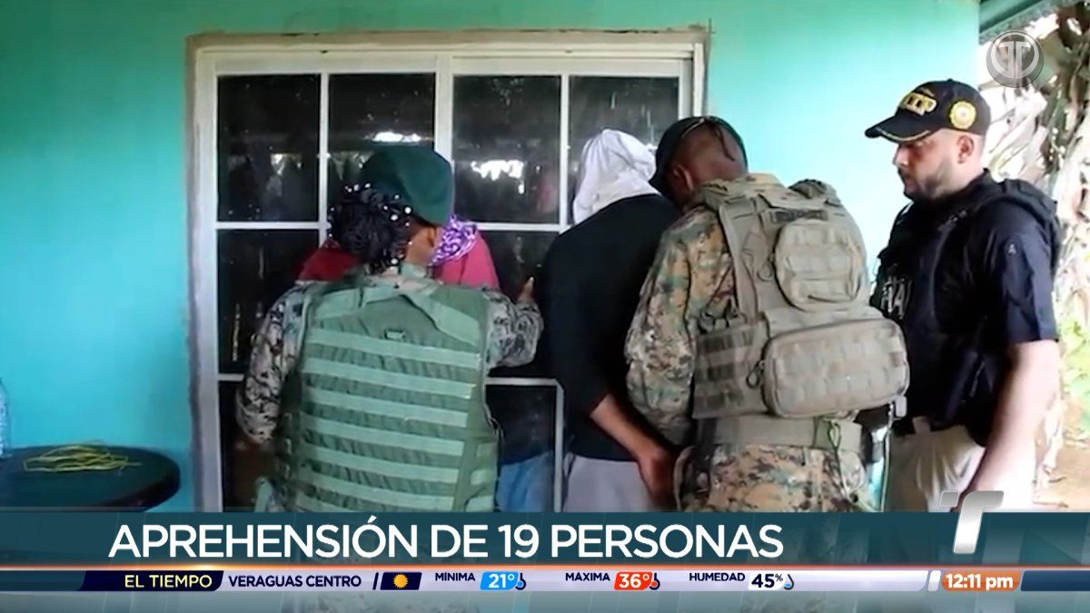 Panamanian police officers and patrol vehicles during coordinated raids as part of Operation Alborada
