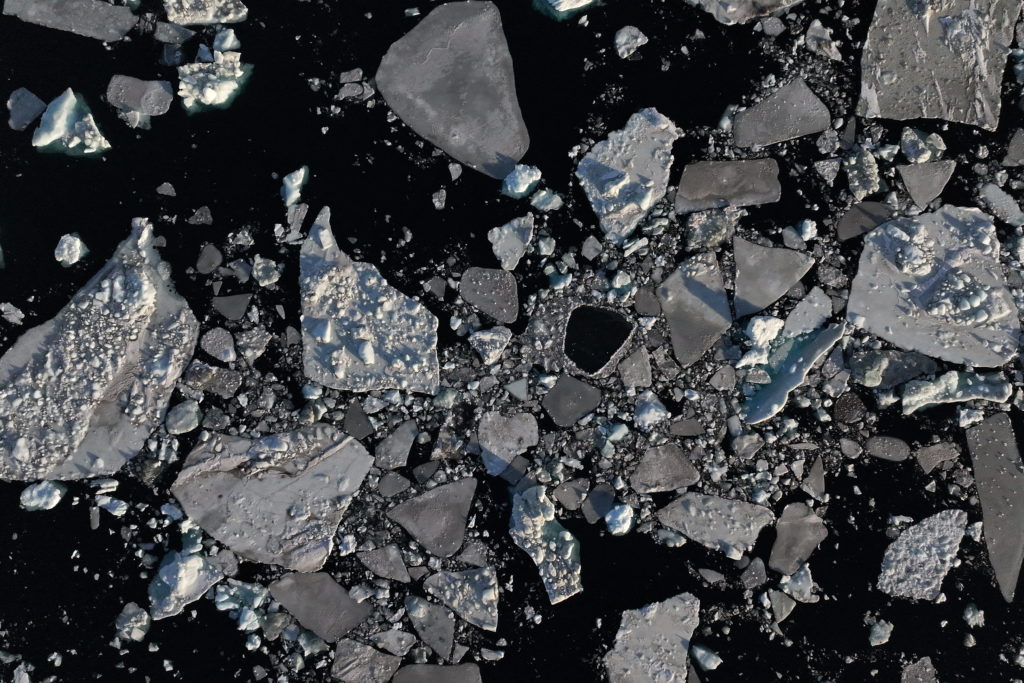 Satellite-like view of receding Arctic sea ice with surrounding ocean water