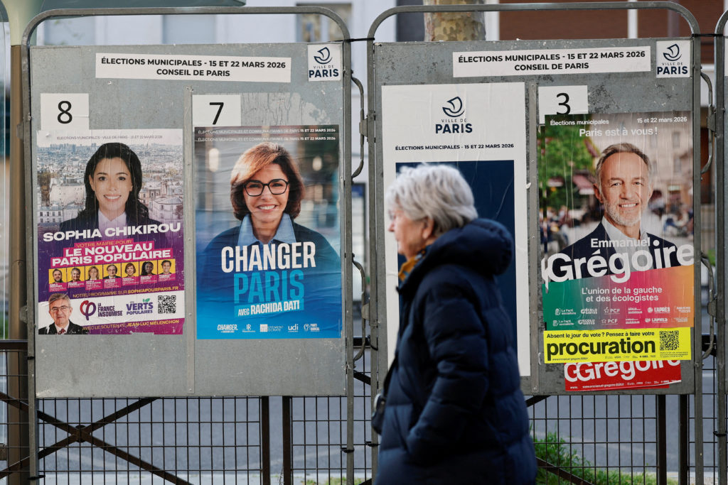 Voters lining up outside a polling station in France during municipal elections