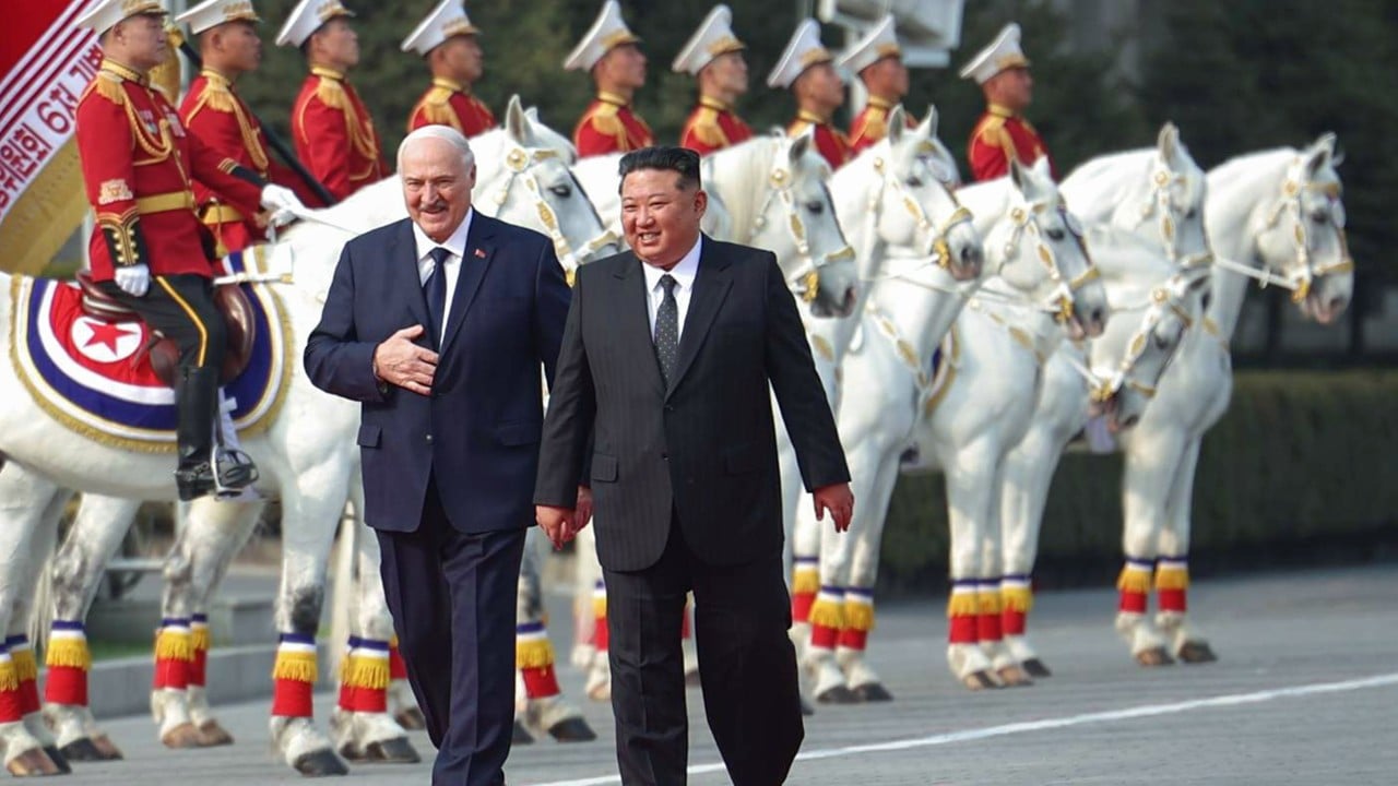 Alexander Lukashenko and Kim Jong-un in Pyongyang during a formal welcome ceremony on Kim Il-sung Square with a military salute