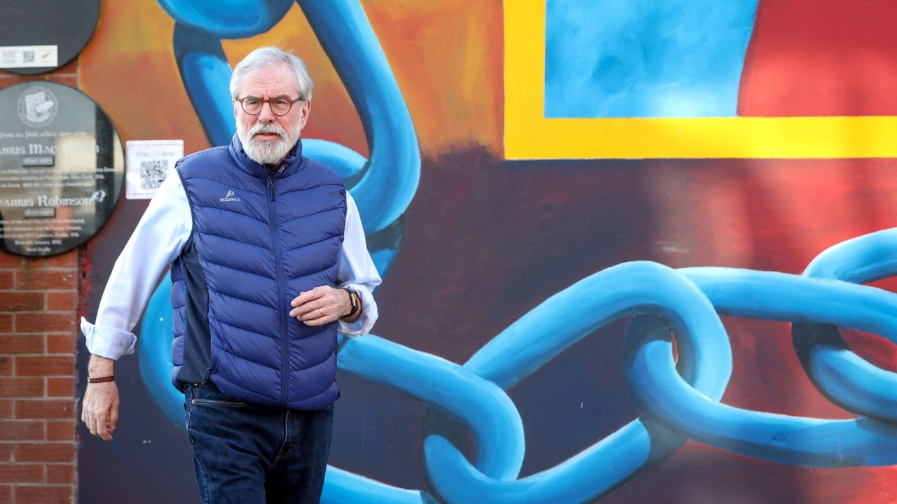Gerry Adams leaving a courtroom during civil proceedings