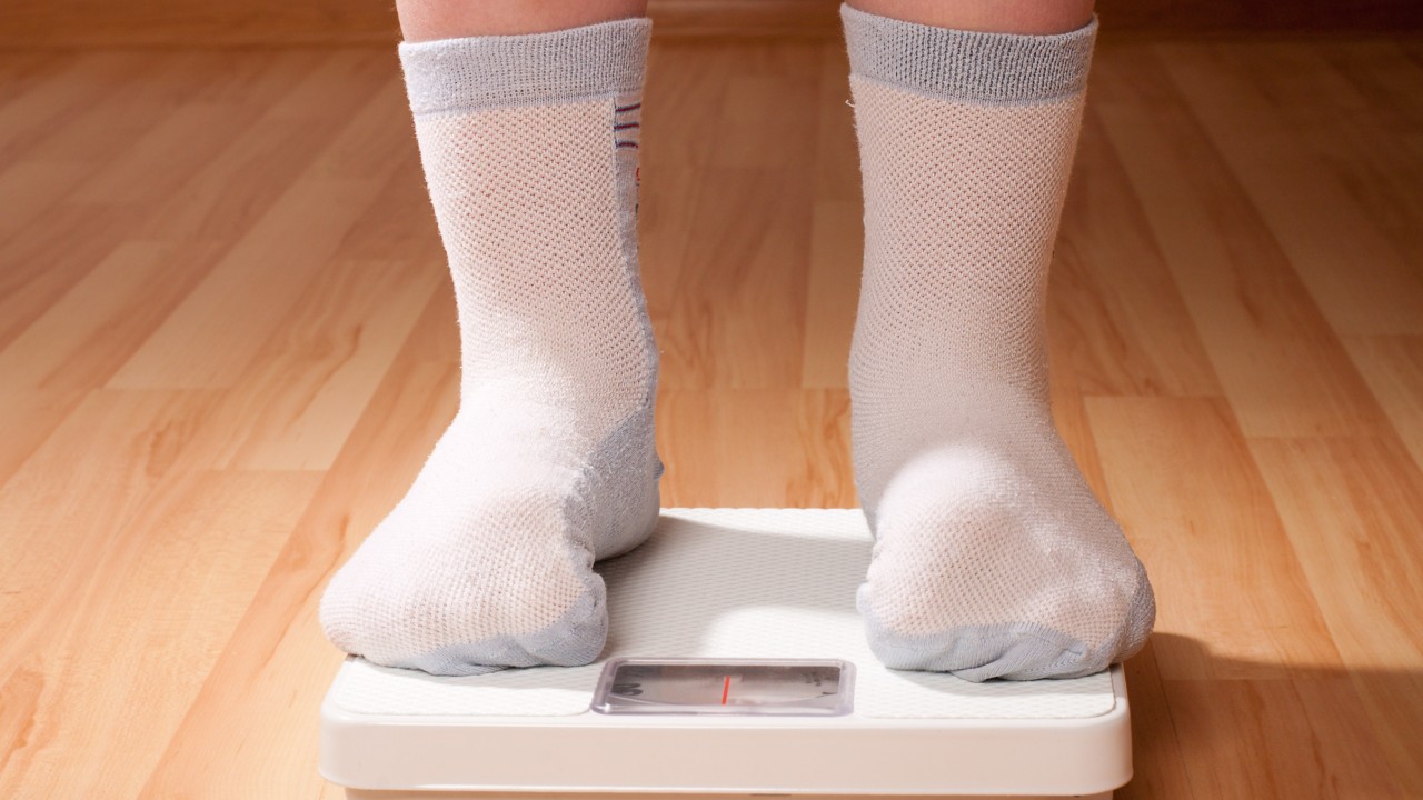 Hong Kong public-health announcement materials or officials at a launch event for a weight management plan