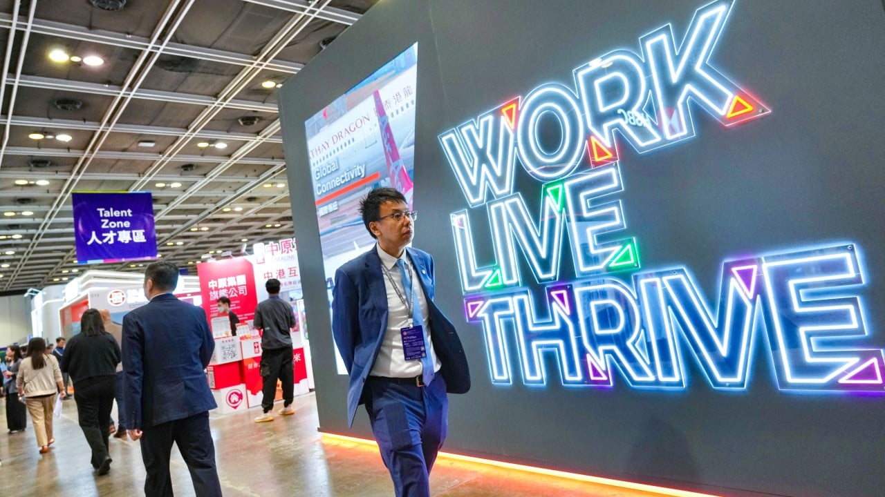 Hong Kong skyline and business district at dusk, representing the city's appeal to global talent