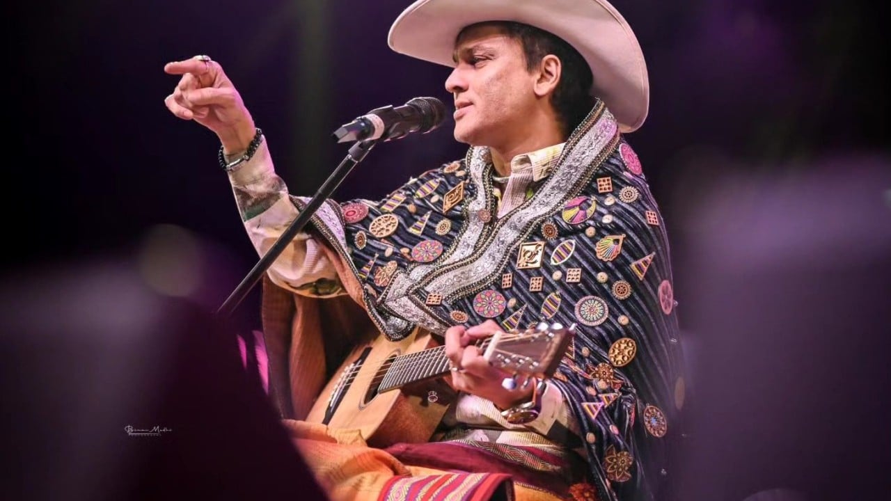 Portrait of Indian singer Zubeen Garg, likely performing on stage