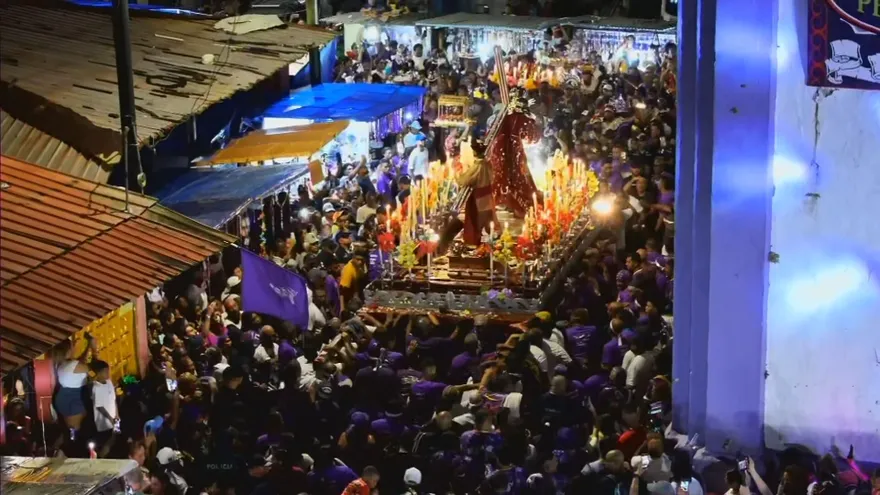Devotees walking through Portobelo’s historic streets during a Holy Week procession honoring the Black Christ