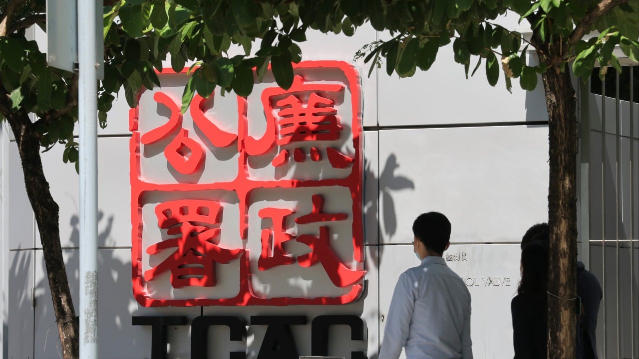 Exterior of a Hong Kong housing estate with high-rise apartment blocks, symbolizing building renovation and anti-corruption enforcement