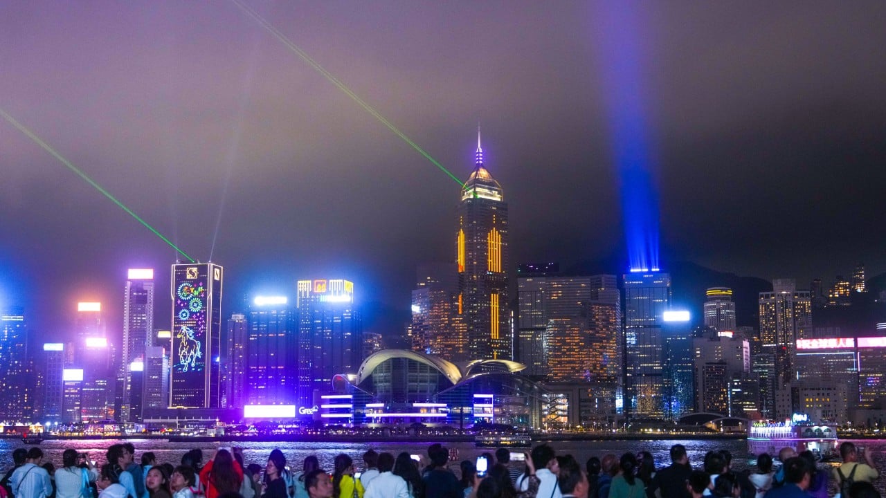 Hong Kong skyline with illuminated billboards and advertising promoting the city, representing an international tourism campaign