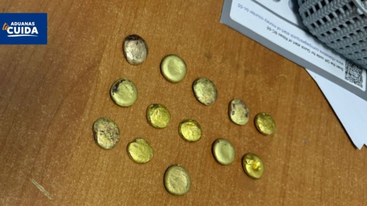 Seized melted gold held in custody at Tocumen International Airport with Panamanian customs officers conducting inspection