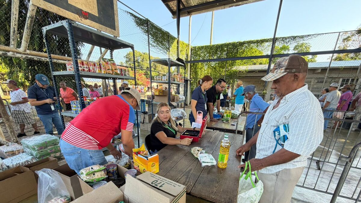 Morning agrofair in Panama with stalls of fresh fruits and vegetables and shoppers browsing for affordable produce