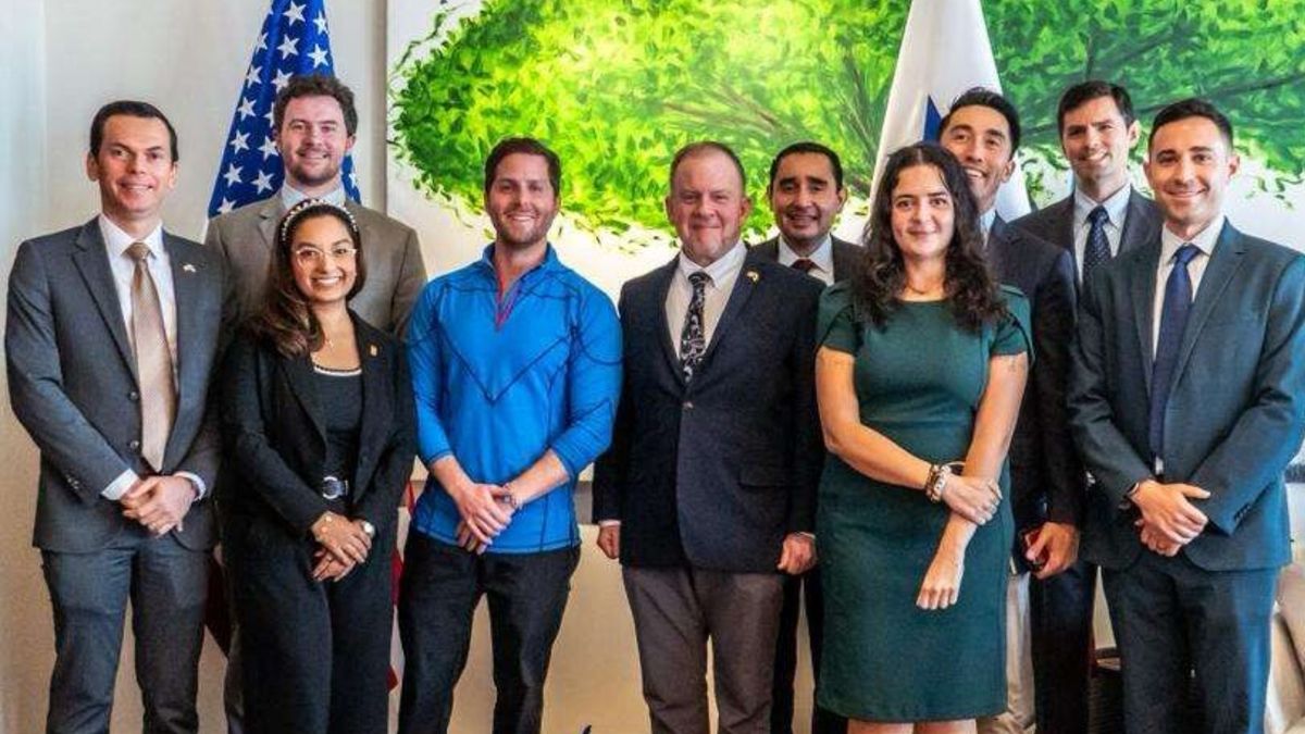 Mayor Mayer Mizrachi in a formal meeting presenting a smart cities proposal to a U.S. State Department official