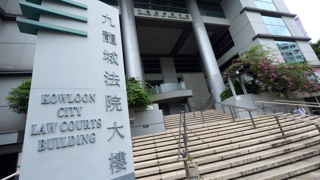 Exterior of Kowloon City Court or a courtroom scene related to a Hong Kong immigration department domestic violence case