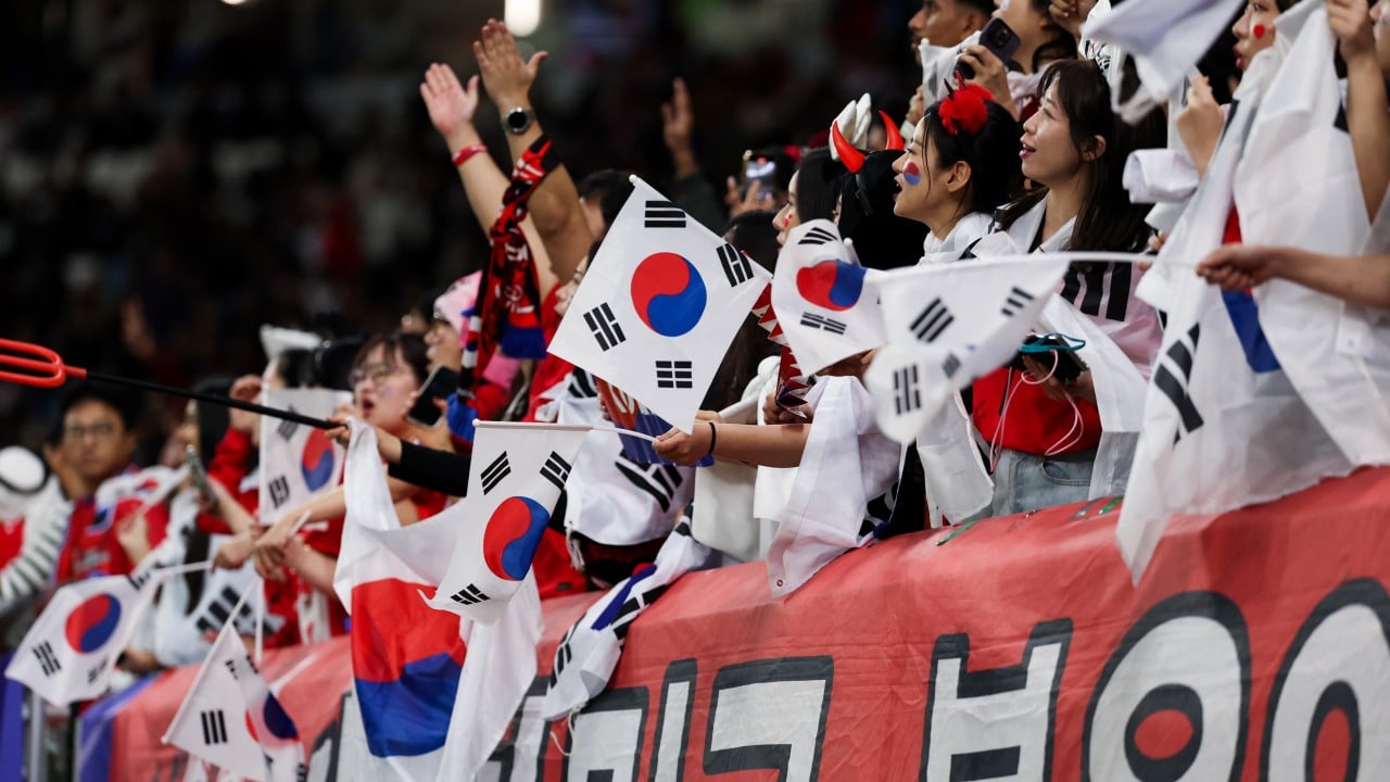 Empty stadium and AFC logo representing the halted bidding process for the Asian Cup