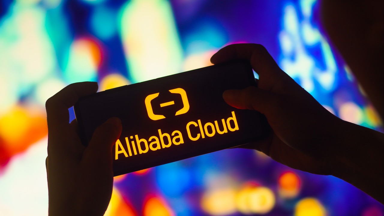 Logos of Alibaba and Baidu over a dimly lit data center server room representing cloud computing and AI infrastructure
