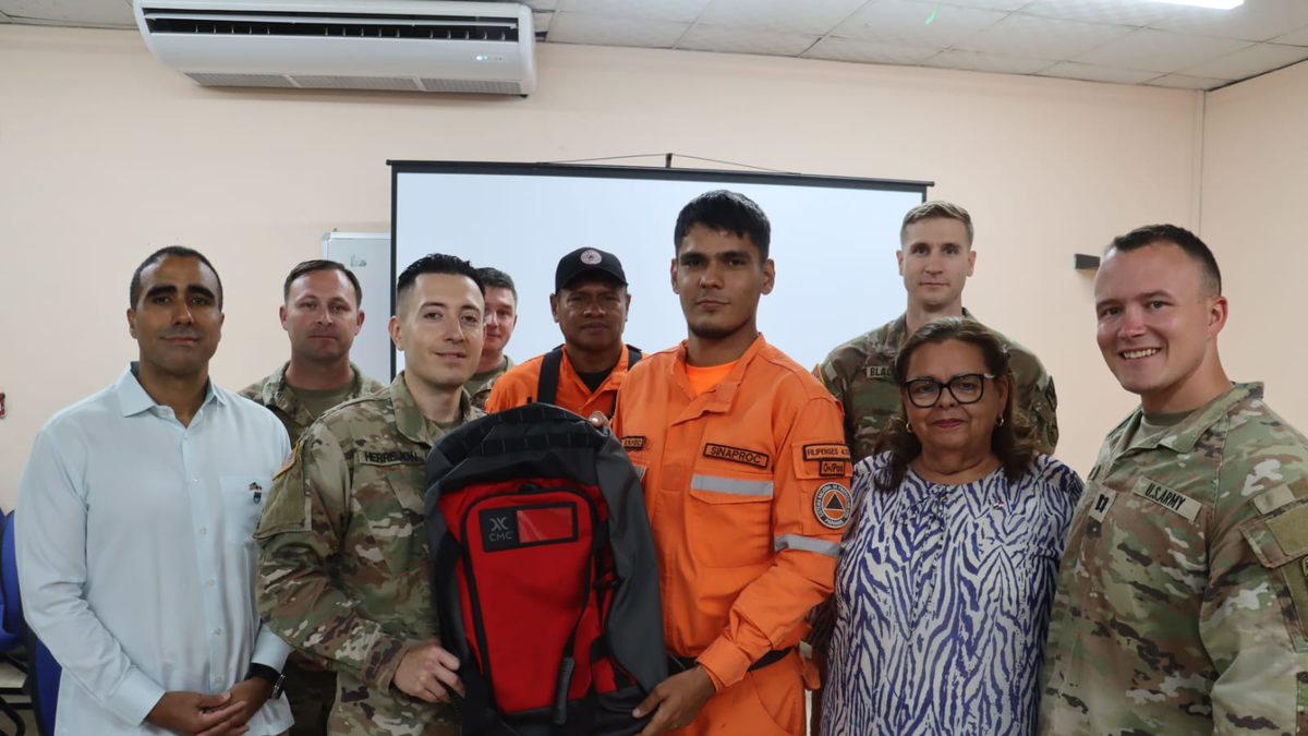 U.S. Embassy and SINAPROC personnel with donated rescue equipment during a handover in Veraguas