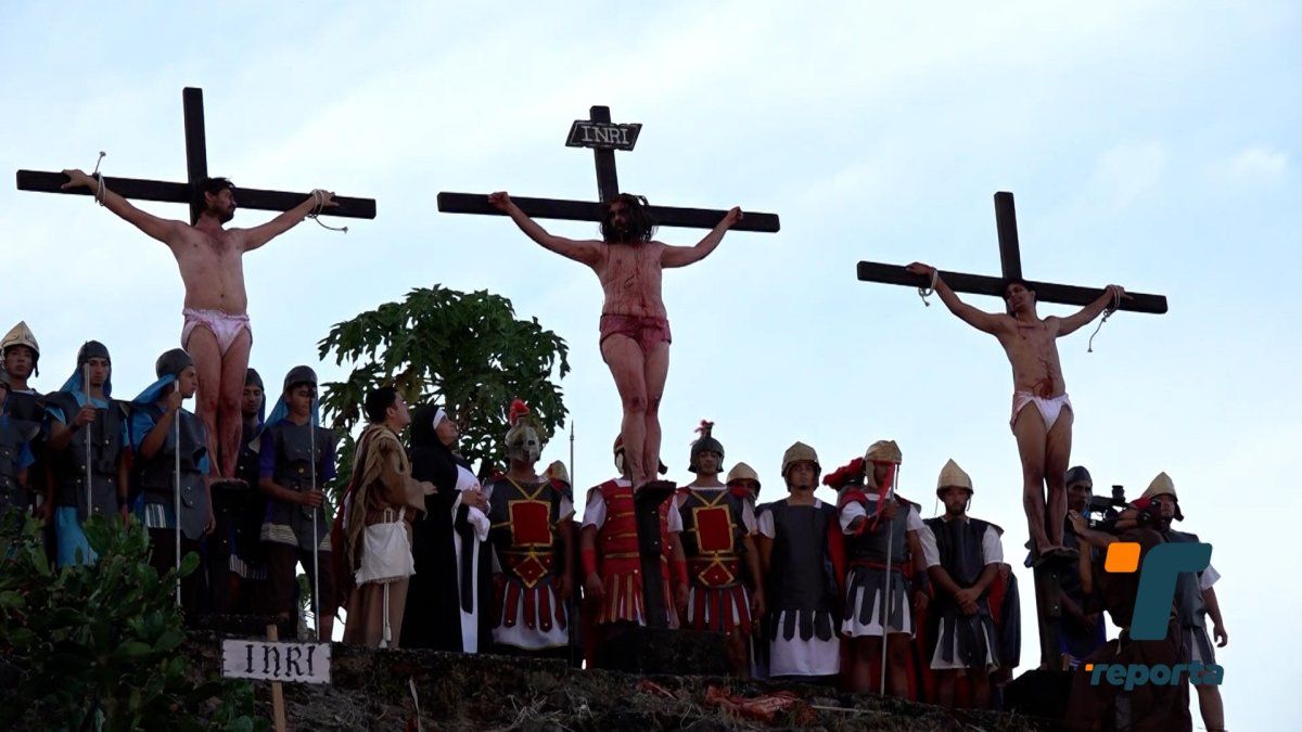 Actors in Pesé performing a Holy Week reenactment of the Passion of Jesus Christ before a large crowd