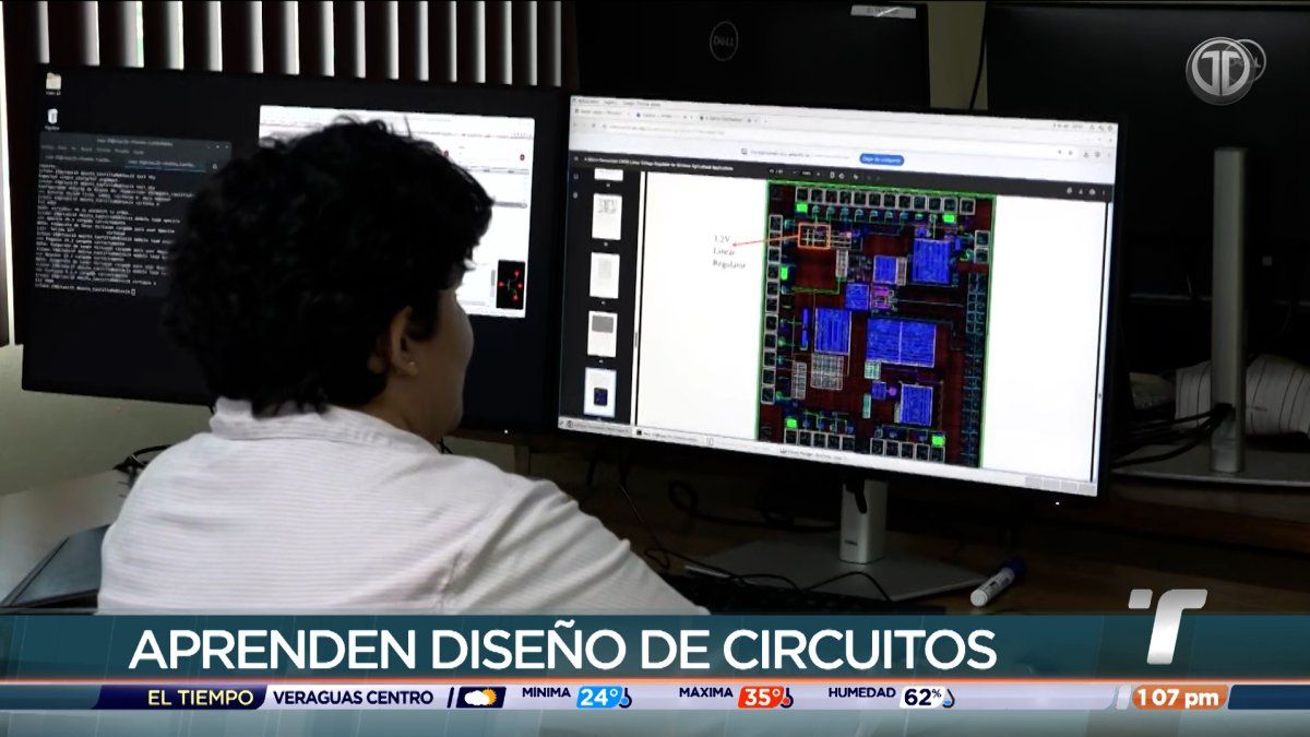 Students and instructors in a university laboratory working on semiconductor design training equipment
