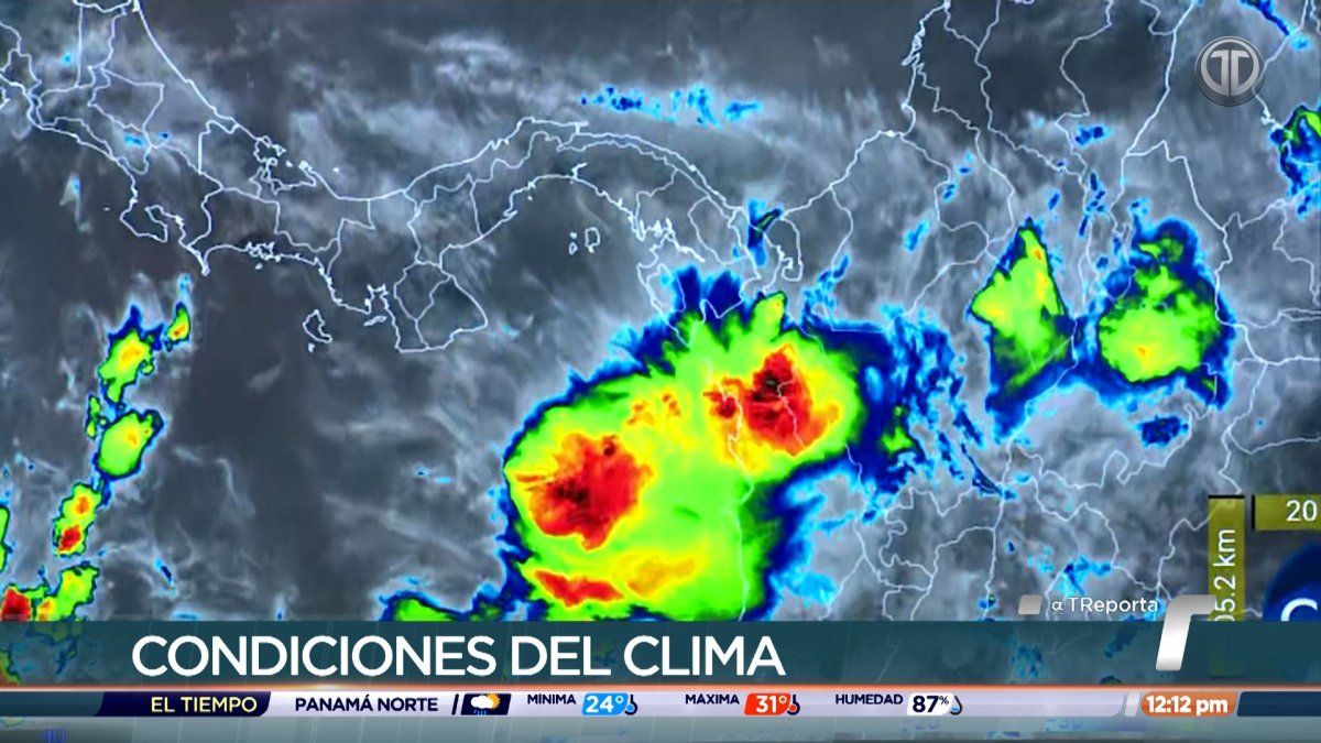 Meteorologist reviewing climate charts and Pacific Ocean temperature data in Panama