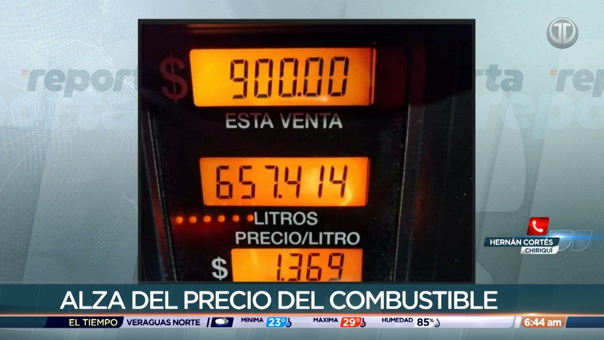 Cargo transport trucks moving goods along a road in Panama's Tierras Altas region