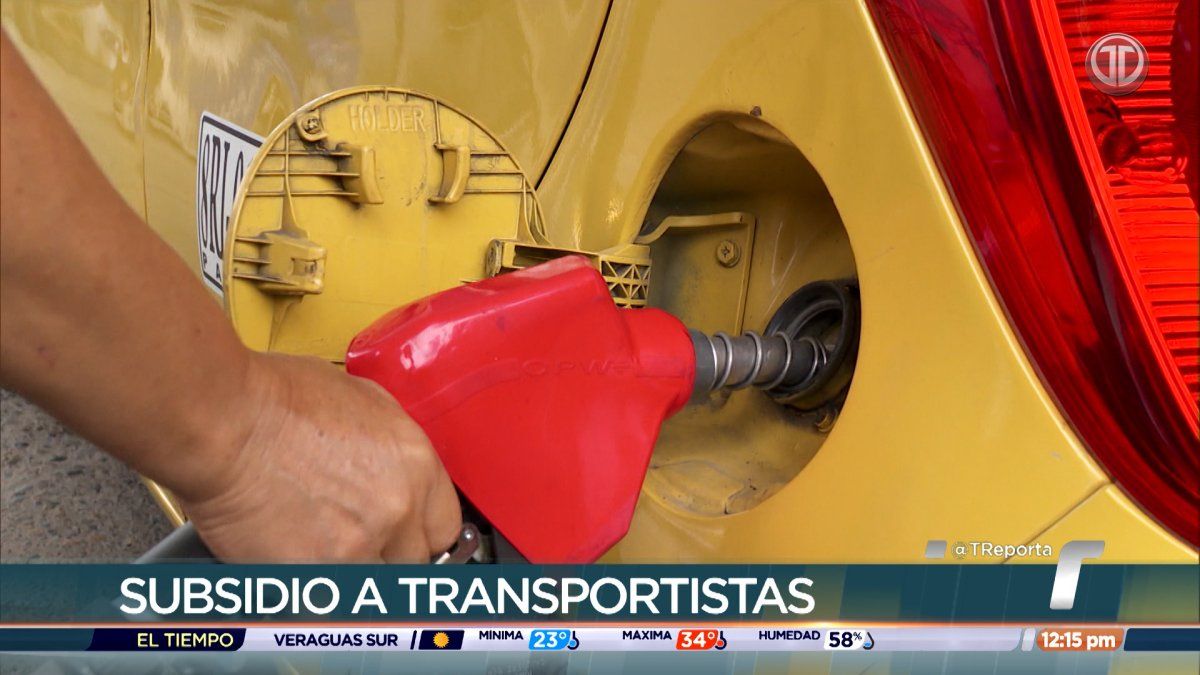 A bus and other transport vehicles in Panama affected by rising fuel costs