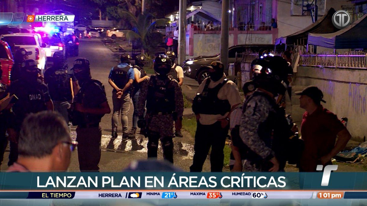 Panamanian security officials on patrol in an urban neighborhood during an anti-crime operation