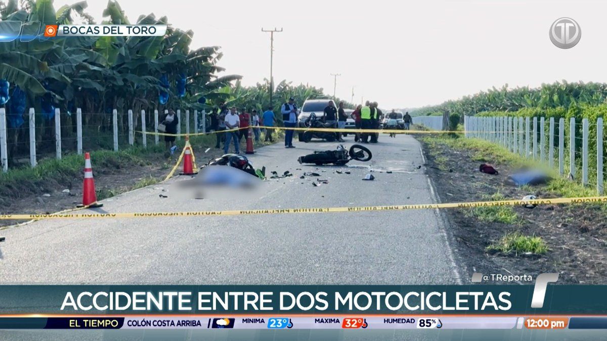 Police or emergency responders near two motorcycles after a fatal head-on crash on a road in Bocas del Toro, Panama