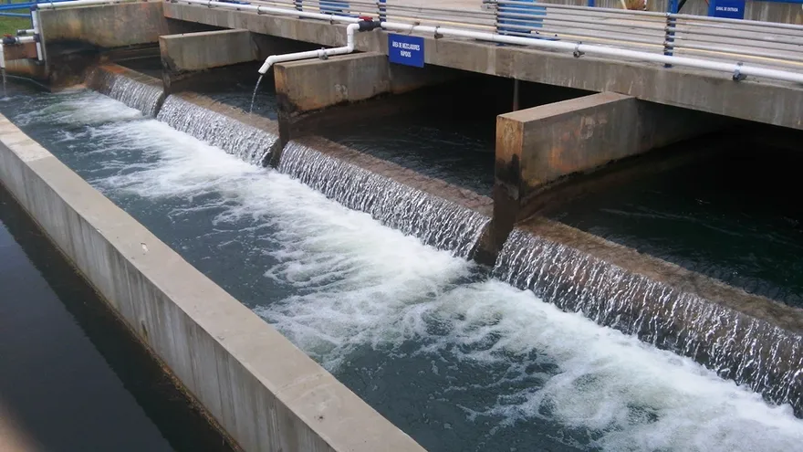 A water treatment facility in Panama with pipes, tanks, and treatment equipment operating under normal industrial conditions