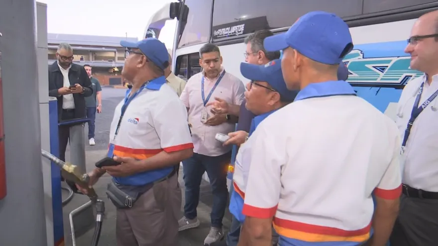 Transport operators in Panama fueling up vehicles at a station under a subsidized fuel program