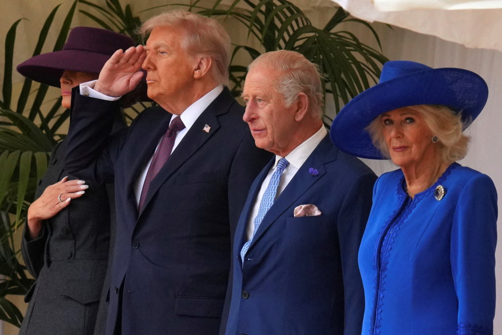 King Charles III and Queen Camilla arriving in Washington for a White House visit with U.S. officials nearby