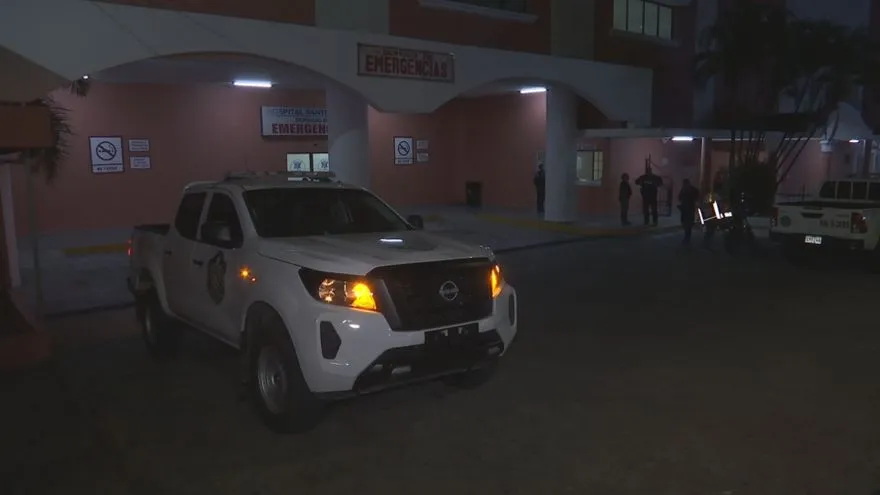 Police officers standing in a Panama City neighborhood during an investigation into the killing of a sergeant in El Chorrillo
