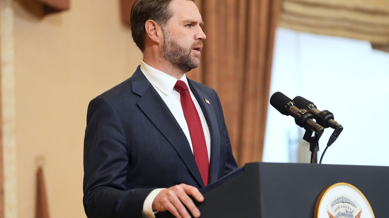 US and Iranian flags displayed beside a conference table during nuclear negotiations
