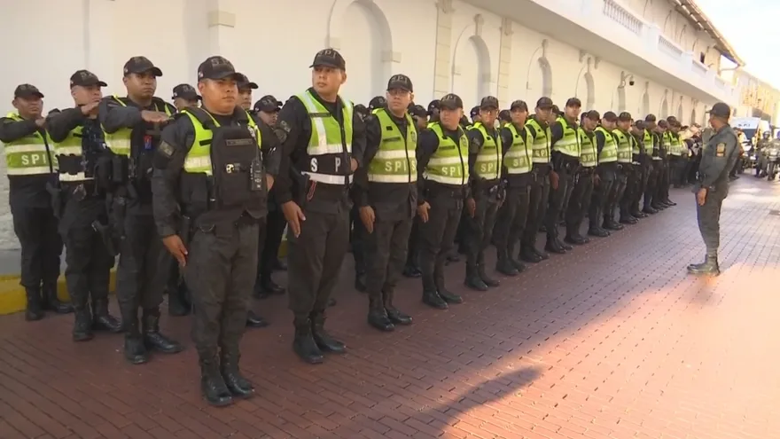SPI agents standing watch in a busy public area in Panama as part of a security deployment