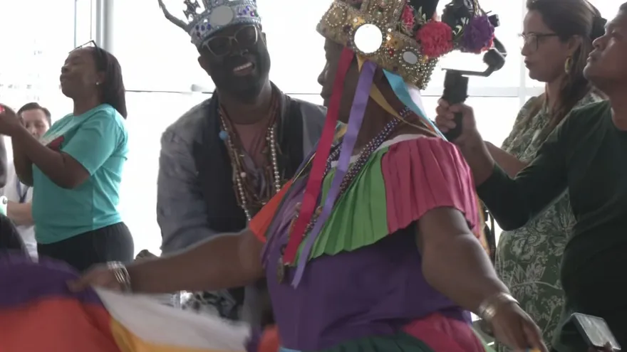 People in traditional Afro-Panamanian Pollera Congo attire celebrating in Portobelo during a cultural festival