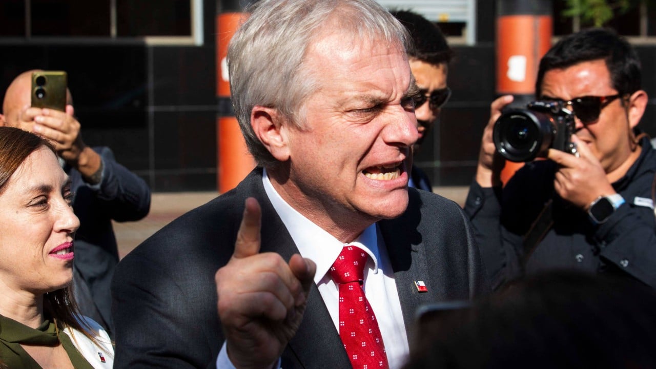 Cargo containers at a Chilean port with copper shipments being inspected by authorities