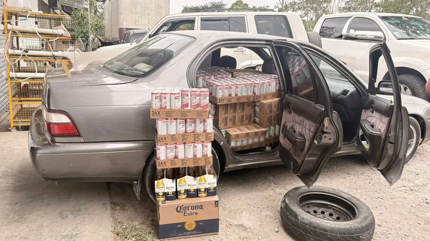 Boxes of alcoholic beverages stacked during a border enforcement seizure in Panama