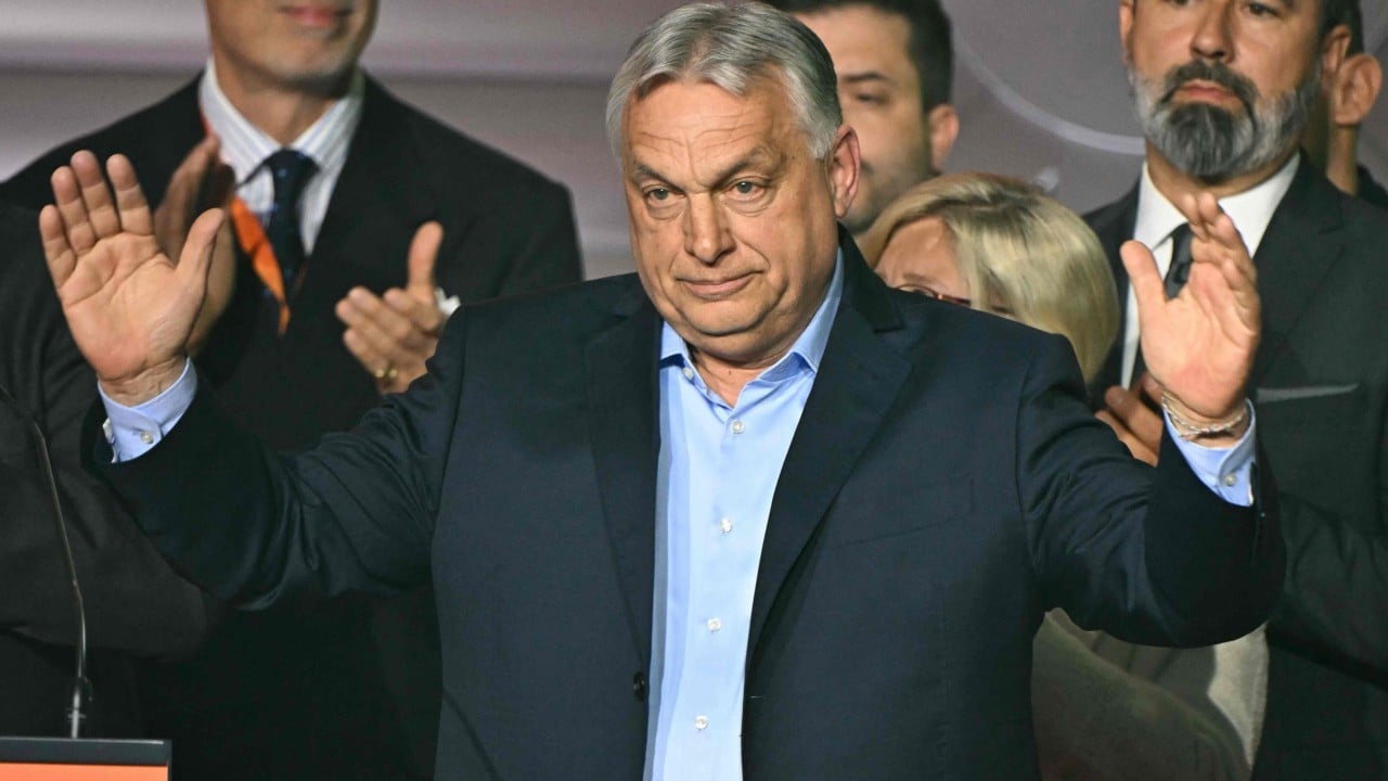 Viktor Orban speaking at an election headquarters in Budapest after conceding defeat