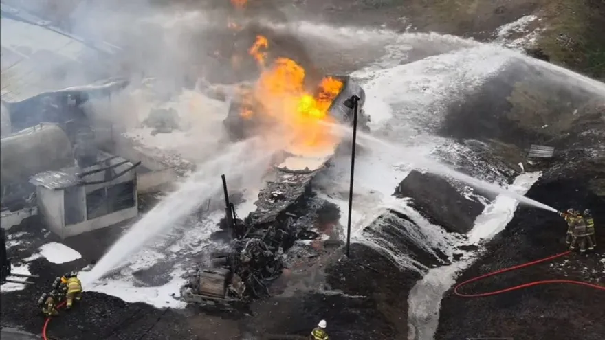 Firefighters in Panama preparing specialized equipment for a hazardous fire response