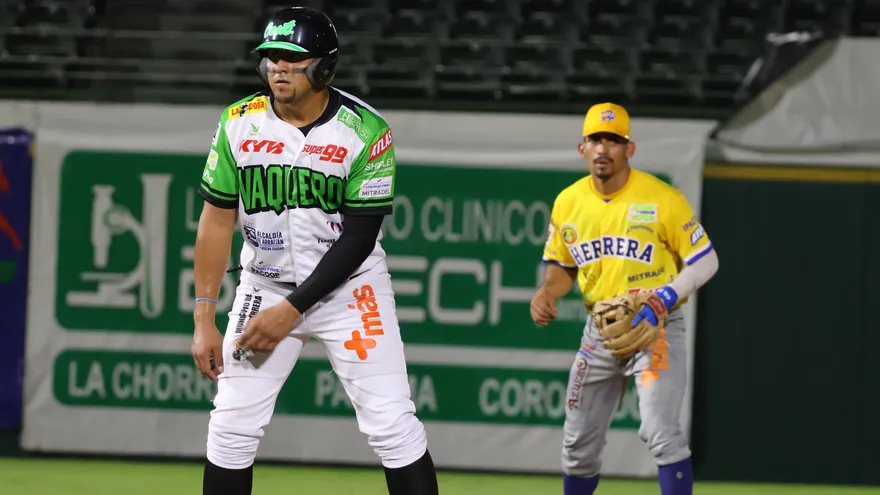 Baseball players preparing for a national championship game in Panama with fans watching from the stands