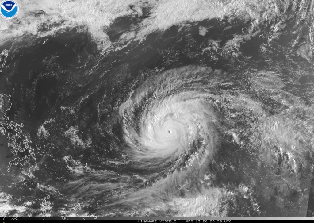 Satellite view of a powerful typhoon swirling over the Pacific Ocean near Guam