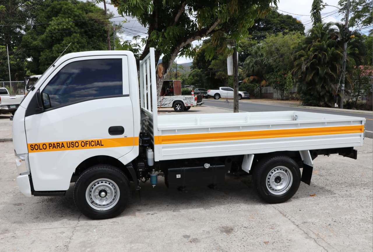 A small white municipal pickup truck parked for delivery to local officials in Panama City