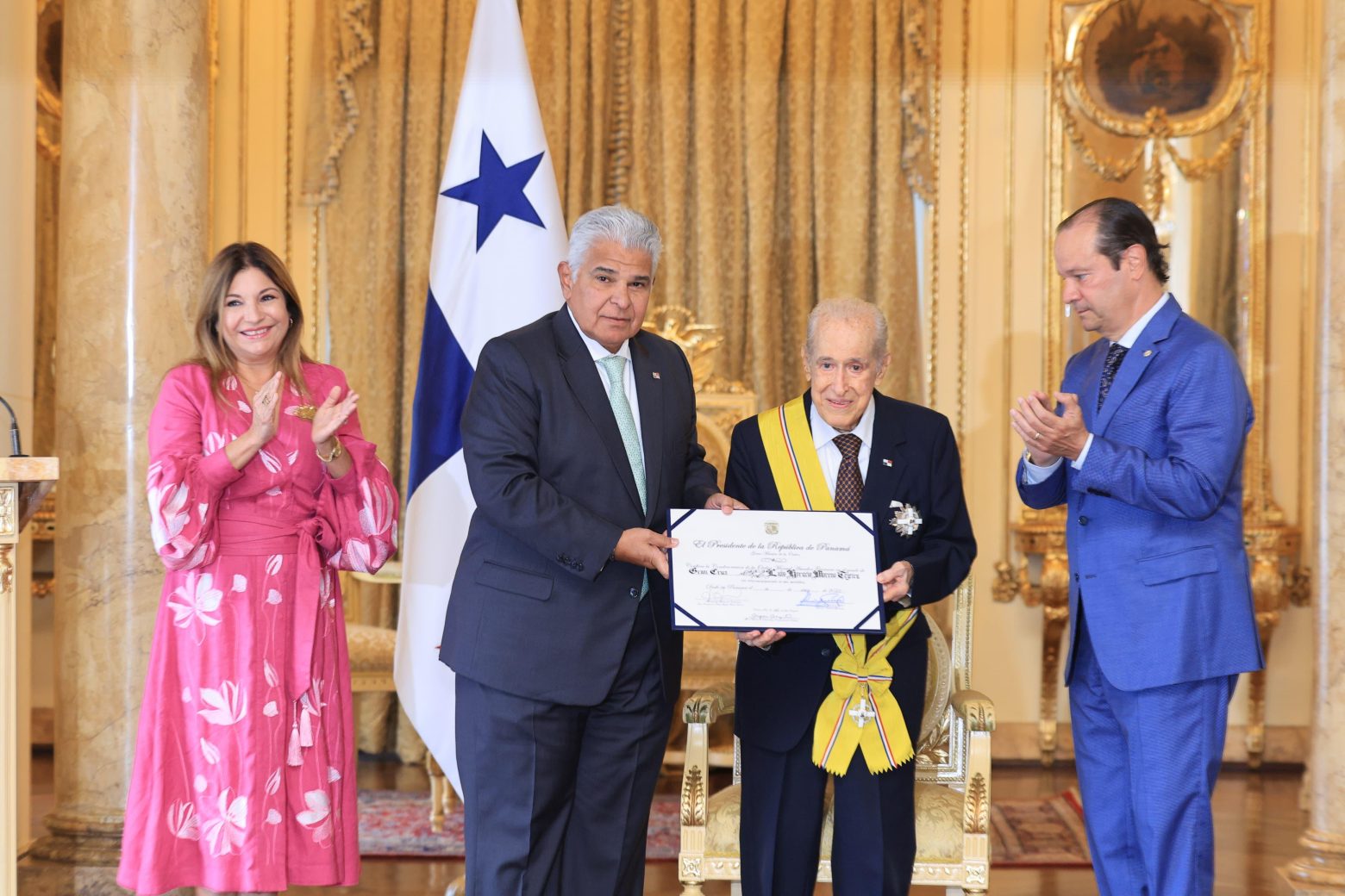 Two Panamanian civic and business leaders honored in a church tribute, with portraits associated with finance and public service