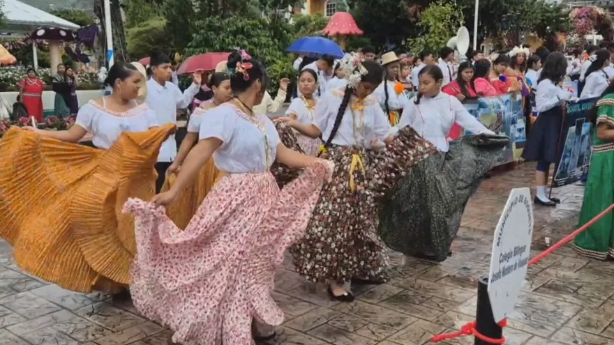 Residents and horse riders taking part in a Boquete anniversary celebration in Panama's Chiriquí province