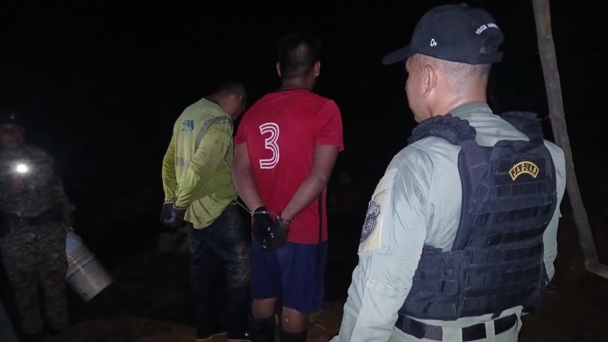 Panamanian security personnel operating near a wooded tributary connected to Gatun Lake