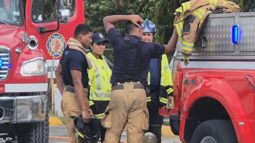Firefighters responding near a hospital waste storage area in Penonomé during an emergency response