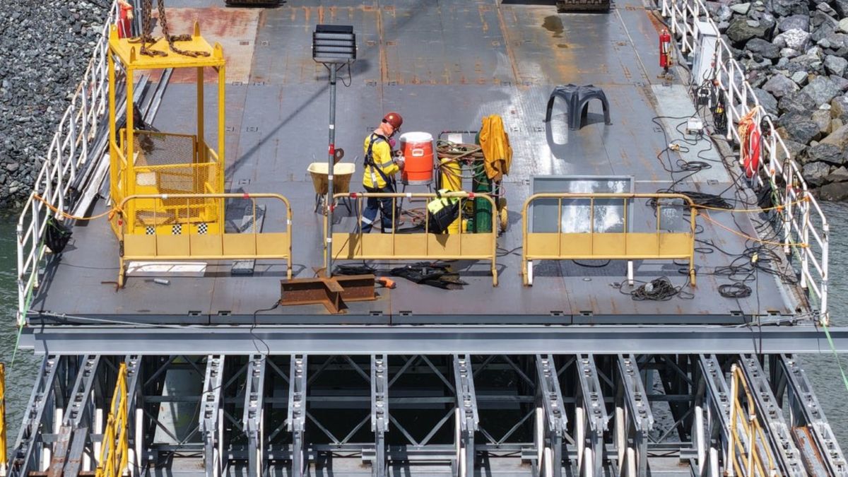 Workers and construction equipment at the Fourth Bridge project site near the Panama Canal