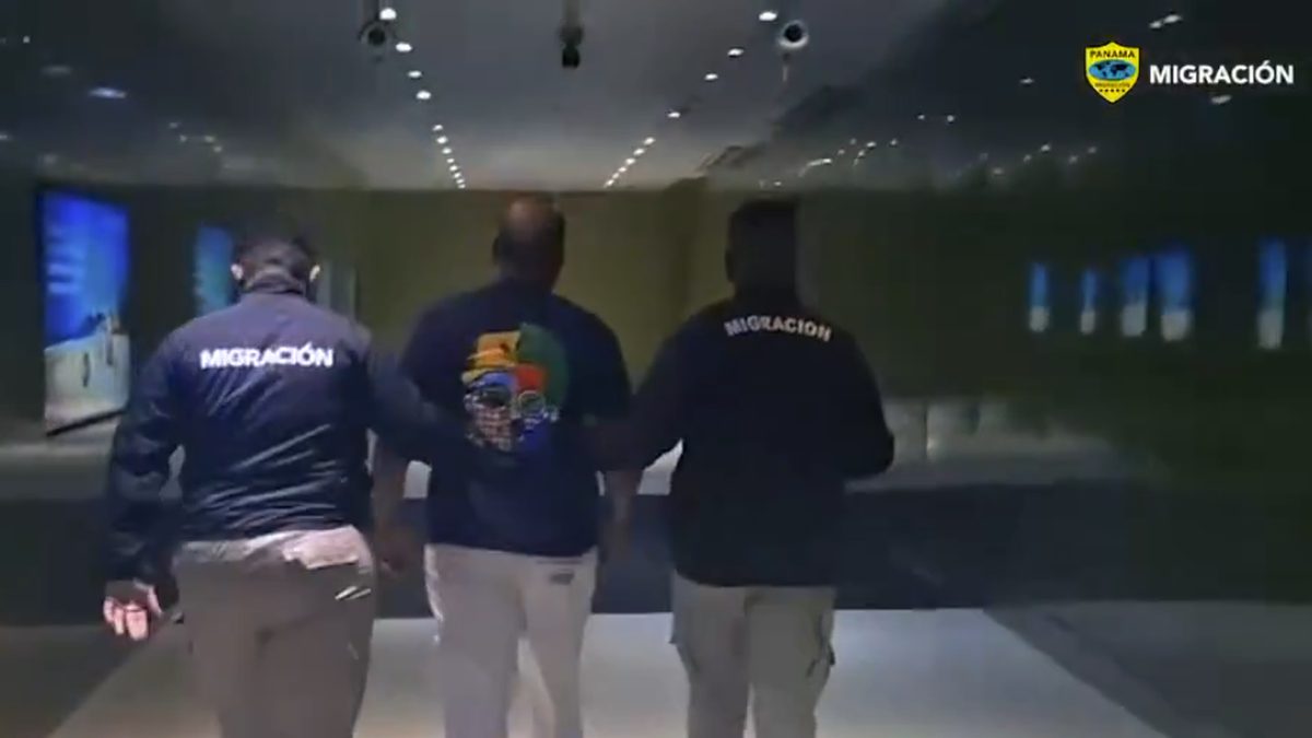 Security personnel at Tocumen International Airport in Panama City during a passenger detention operation